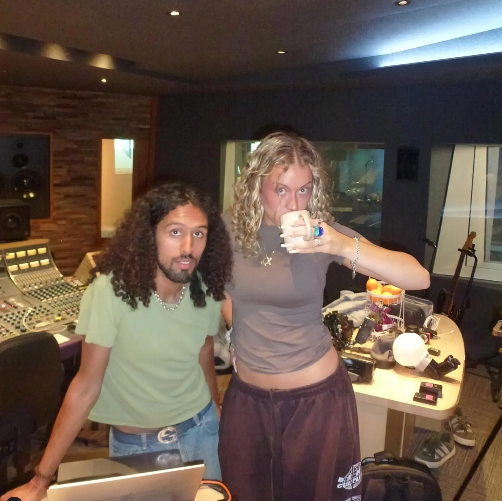 Two people in the Salvation Studios control room