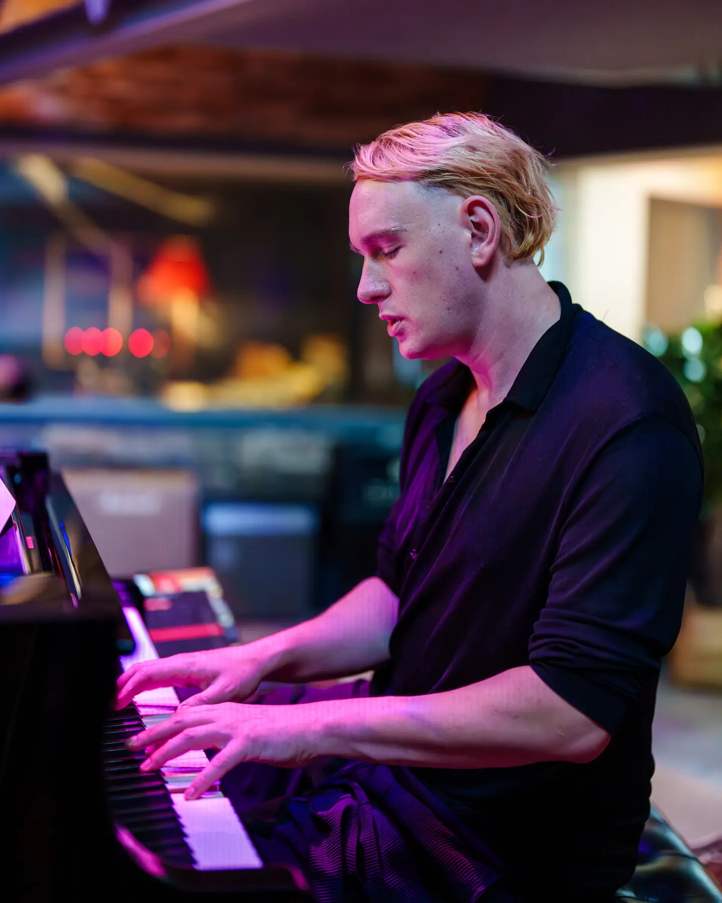 Keyboard player performing in the Salvation Studios live room