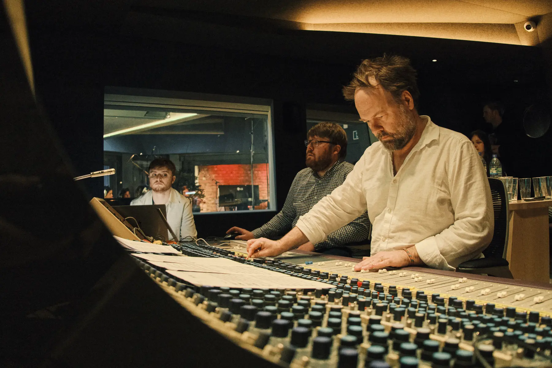 Engineer working at the Salvation Studios mixing console