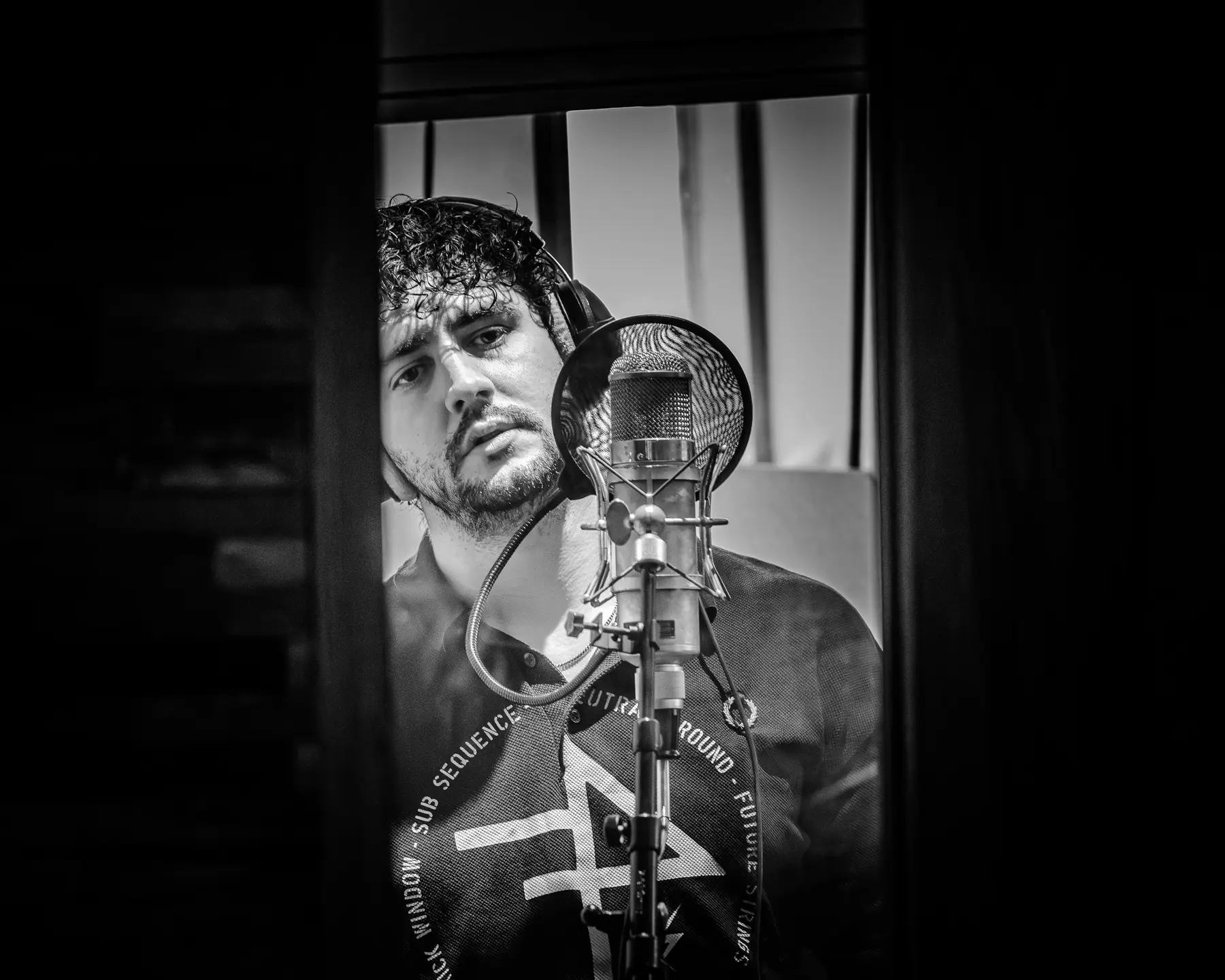 Charlie from SNAYX in the vocal booth 2025